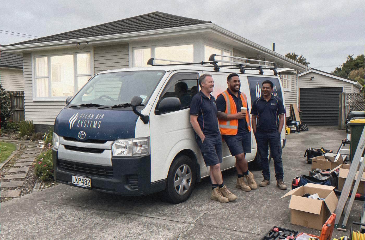 The Clean Air Systems installation team beside their van